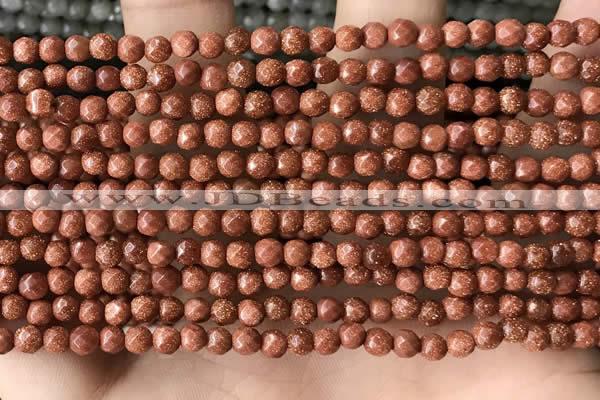 CTG3590 15.5 inches 4mm faceted round goldstone beads wholesale