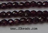 CTG555 15.5 inches 4mm faceted round tiny purple garnet beads