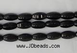 CTO116 15.5 inches 5*10mm faceted rice black tourmaline beads