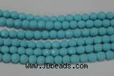 CTU1220 15.5 inches 4mm faceted round synthetic turquoise beads