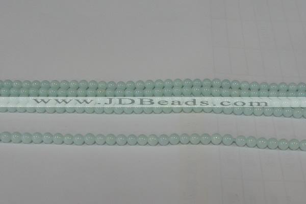 CTU2563 15.5 inches 4mm round synthetic turquoise beads