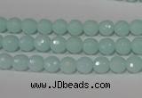 CTU2572 15.5 inches 6mm faceted round synthetic turquoise beads