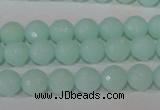 CTU2573 15.5 inches 8mm faceted round synthetic turquoise beads