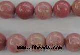 CWF14 15.5 inches 10mm round pink wooden fossil jasper beads