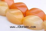 CYJ40 10*14mm twisted rice yellow jade gemstone beads Wholesale