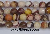 CZJ278 15.5 inches 4mm faceted round zebra jasper beads