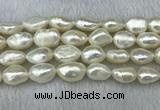 FWP304 15 inches 11mm - 12mm baroque white freshwater pearl strands